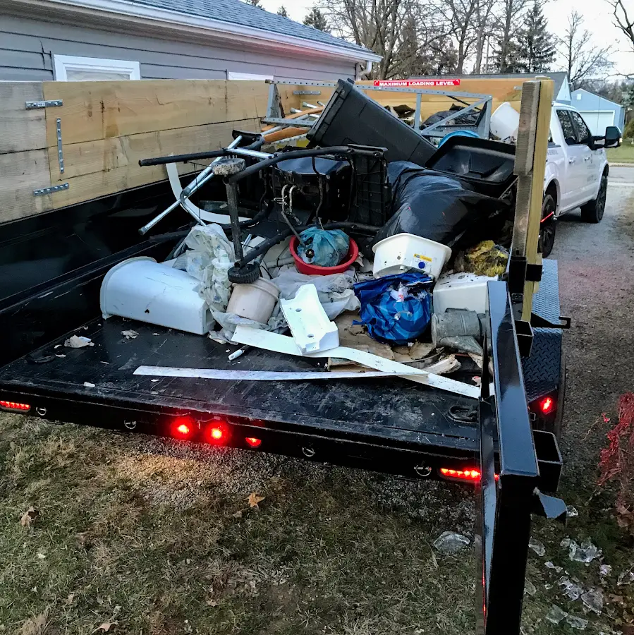 Roll-off dumpster delivered to a residential driveway in Kaukauna